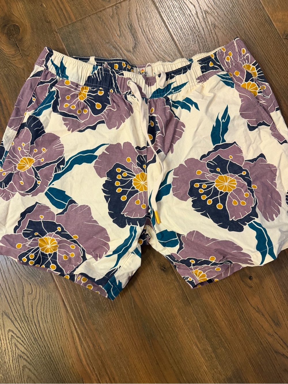 Marine Layer Men's Floral Drawstring Swim Shorts fully lined in White and Purple